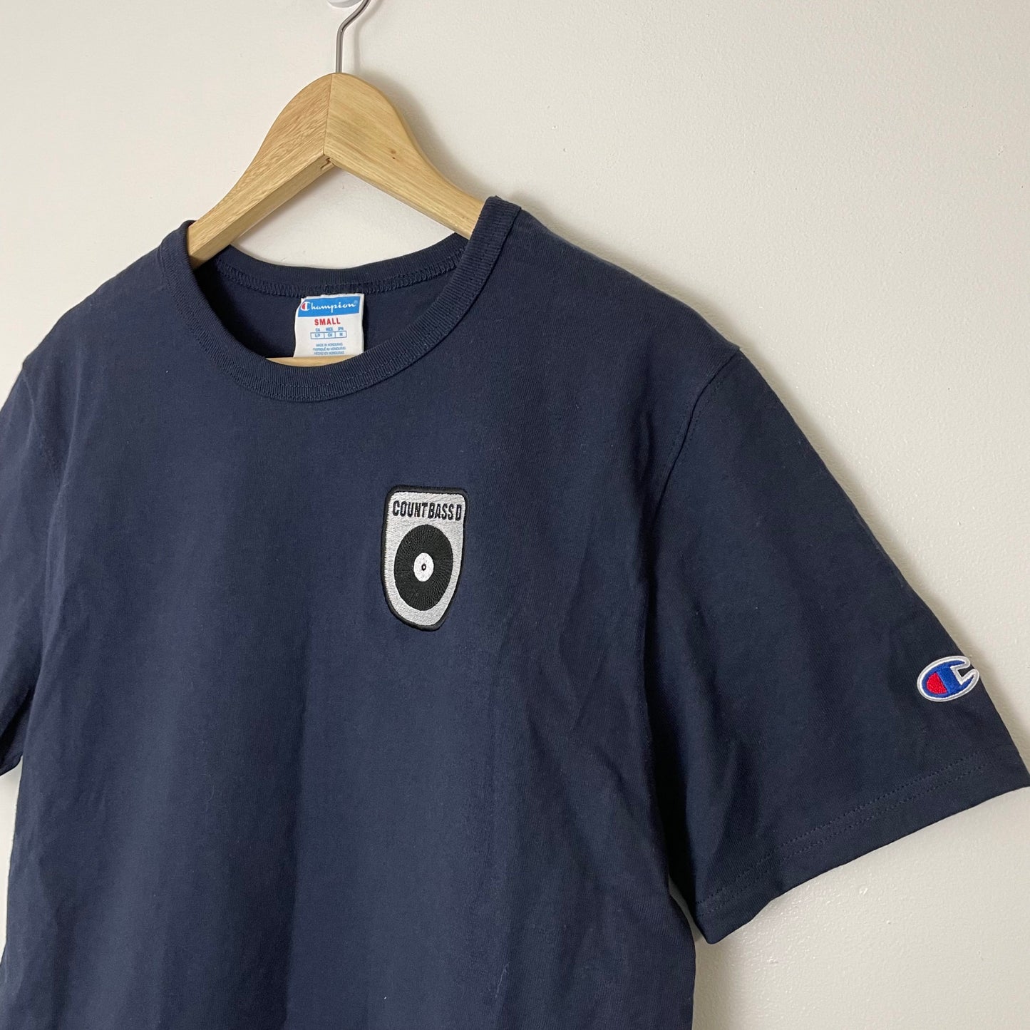 Champion Embroidered Count Bass D Logo Tee Navy Blue